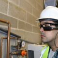 Worker Checks Guages