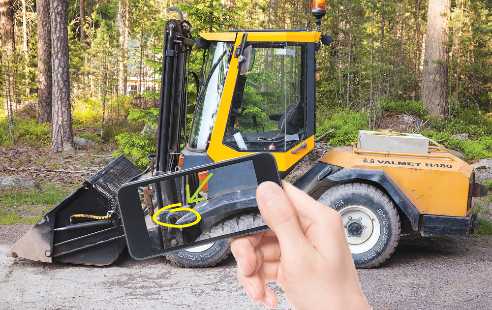 Person Taking Photo of Heavy Equipment