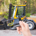 Person Taking Photo of Heavy Equipment
