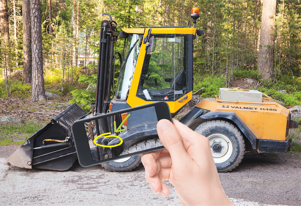 Person Taking Photo of Heavy Equipment