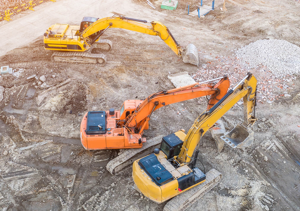 Mixed Fleet Excavators Digging at Quarry